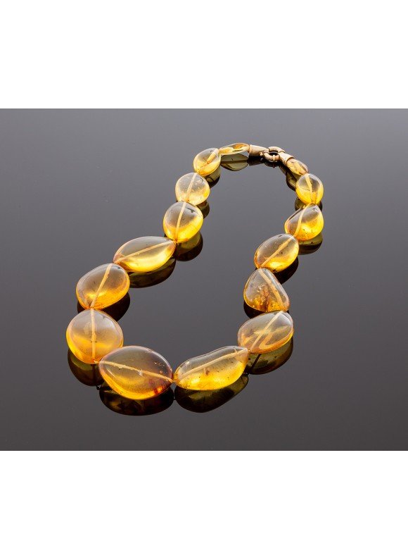 Transparent amber necklace with inclusions